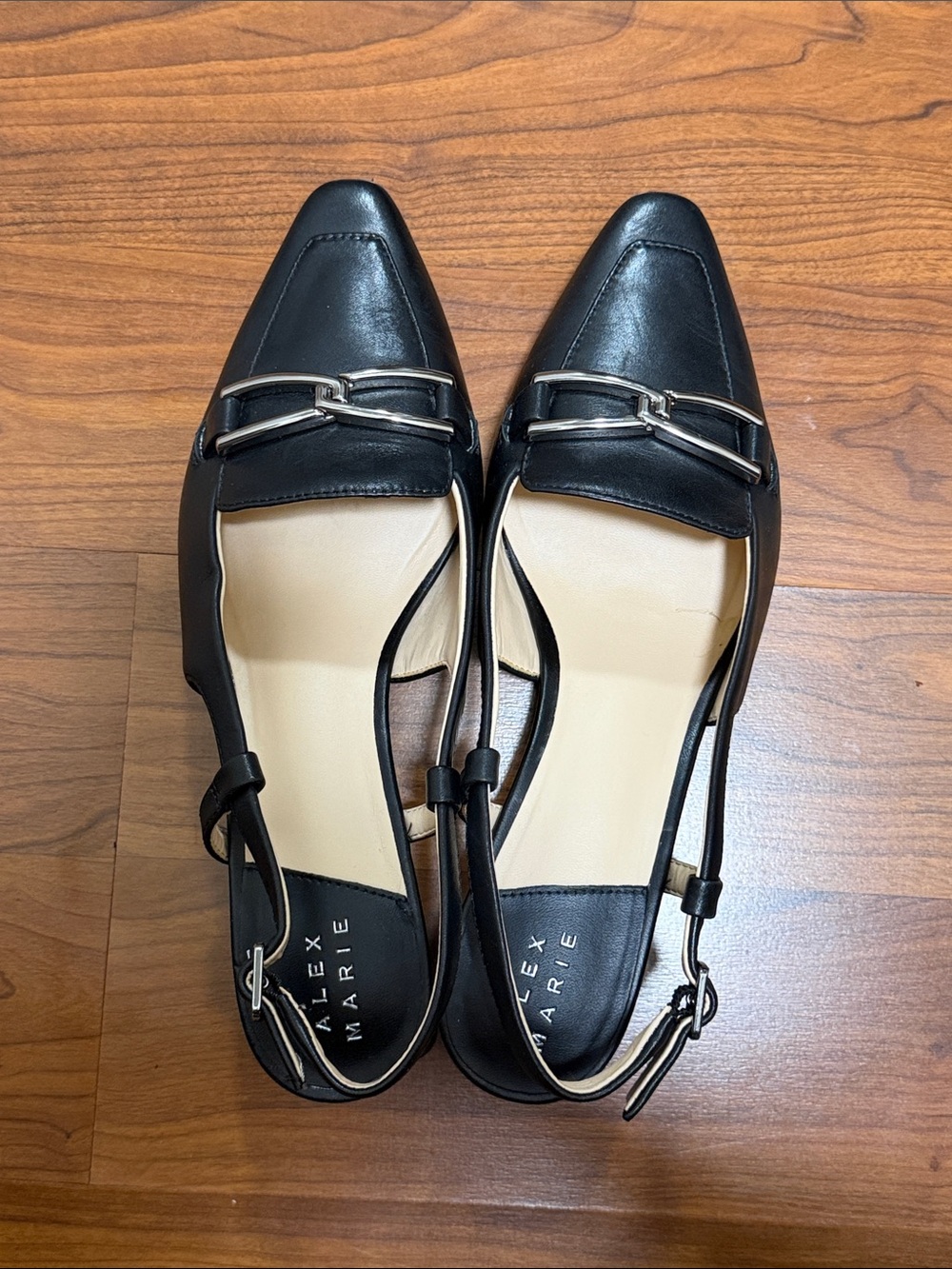 Alex Marie Black Leather Pointed-Toe Slingback Flats with Silver Buckle
